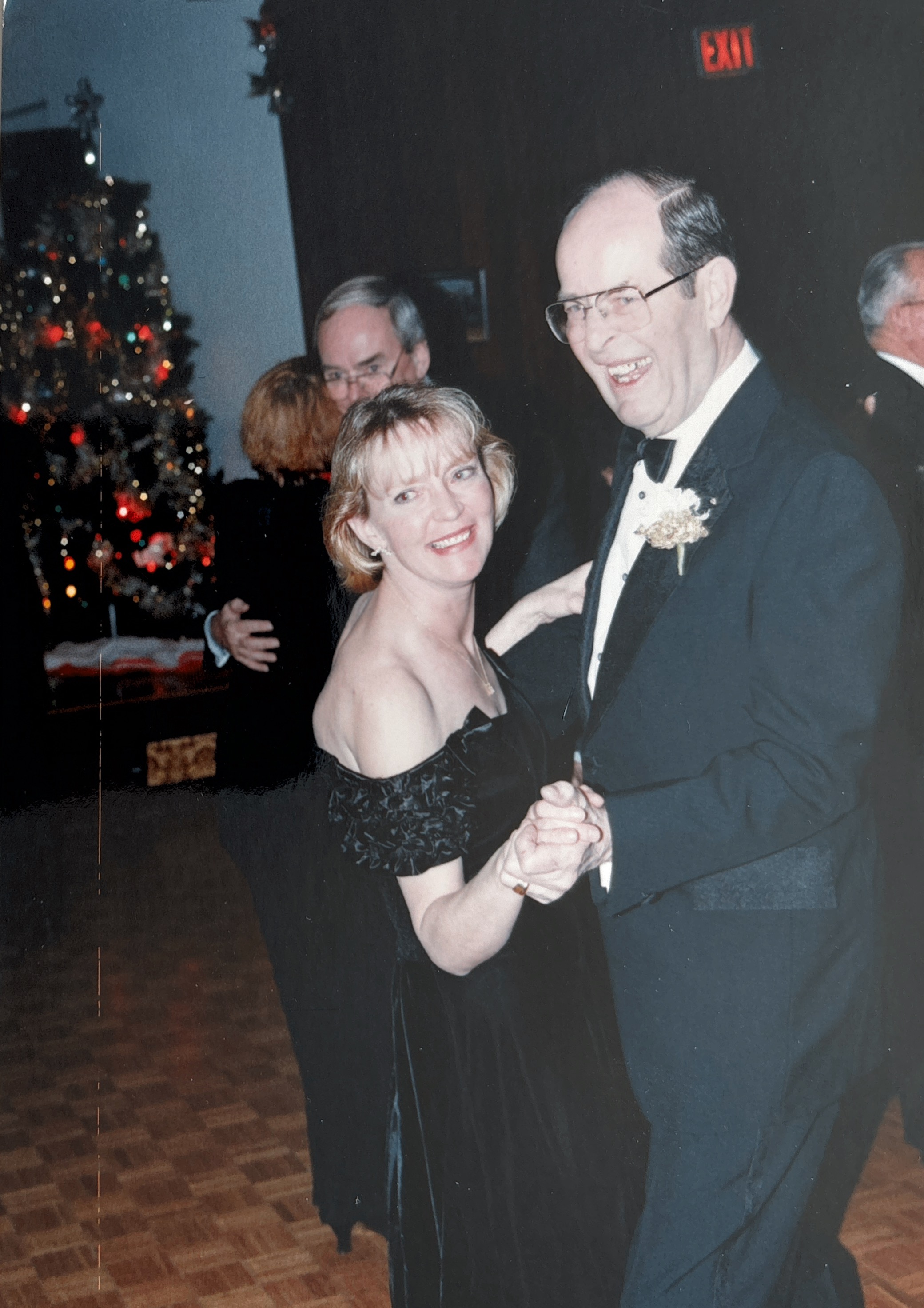 joan with her father at formal event